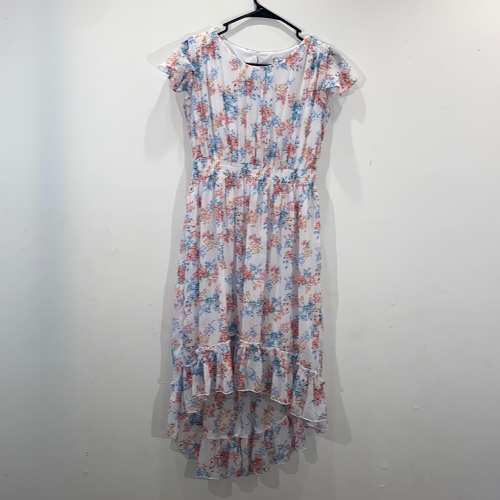 Flowing, white, floral, lightweight, sleeveless dress with ruffles!